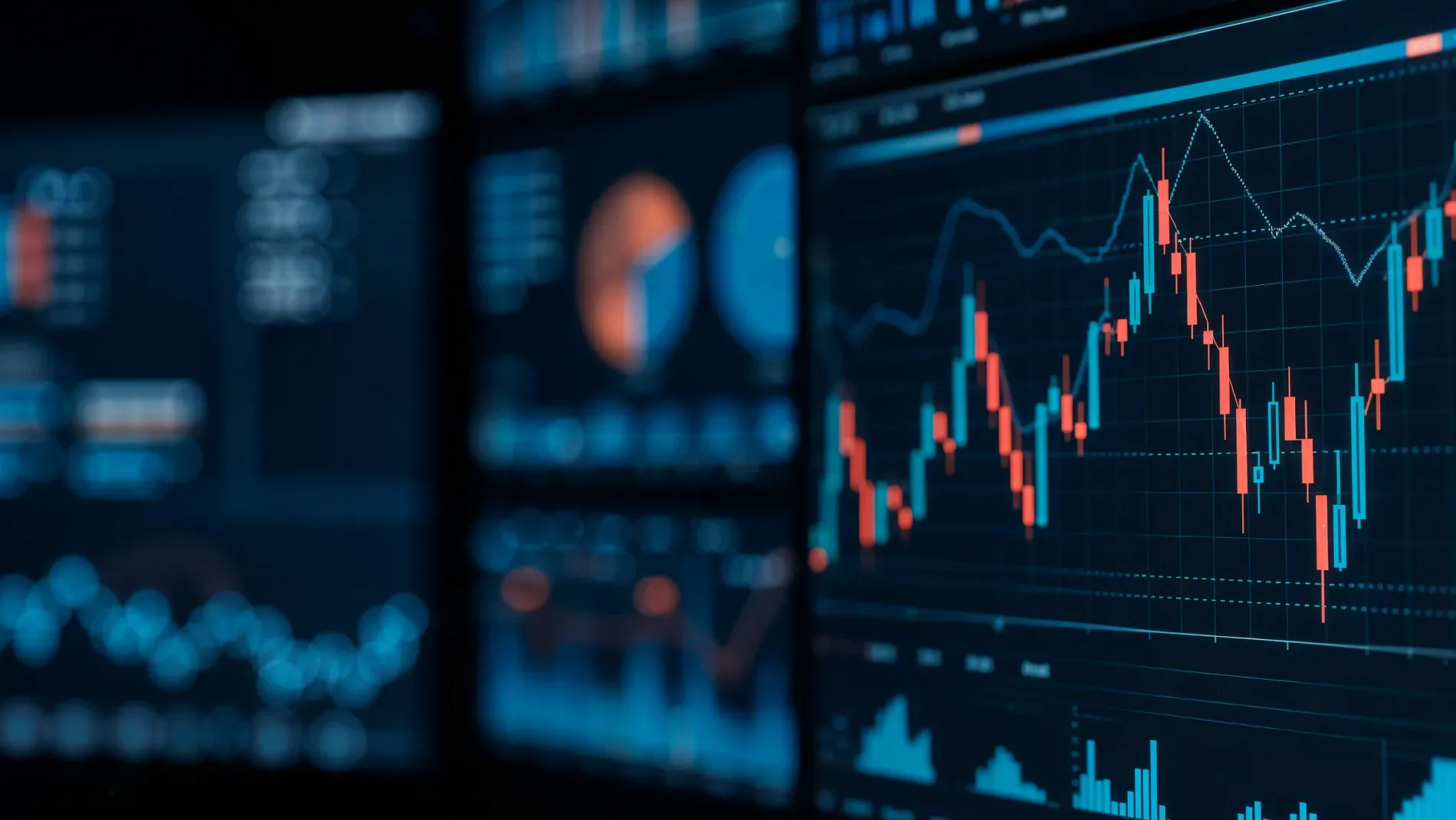 Trading screens in close-up, red and blue candlesticks on a chart with blurred dashboards behind